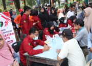 Peringati Hari Bhayangkara ke-79, Polres Sumenep Gelar Senam Massal dan Layanan Gratis di CFD Taman Bunga
