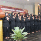 Para warga baru PSHT Cabang Sumenep resmi disahkan dalam prosesi sakral di Gedung KORPRI, Sabtu malam (19/7/2025). (Foto:Klik Times). 