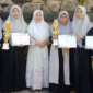 Para siswi Yayasan Ar-Rahman berpose usai meraih juara dalam ajang lomba Bahasa Arab di Universitas Annuqayah, Guluk-Guluk, Sumenep (Foto:Klik Times). 